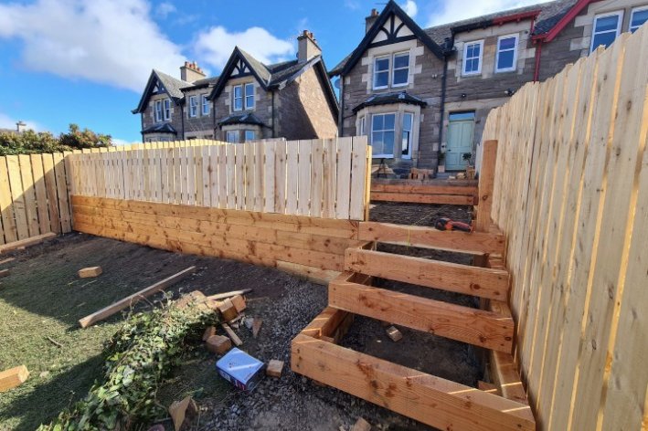 Timber retaining wall and steps